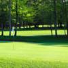 A sunny day view of a hole at South Muskoka Curling and Golf Club.