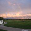 A view of rainbow over a tee at Sawmill Creek Golf Resort & Spa.