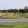 A view of a hole surrounded by water at Sawmill Creek Golf Resort & Spa.