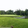 A view of hole #15 surrounded by water at Six Foot Bay Resort Golf Club