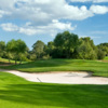 View of a green and bunker at GreeneAcre Golf Club