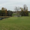 A fall view of a green with water coming into play at Woodlands Links Golf Course