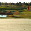 A view of a green with water coming into play at Granite Ridge Golf Club