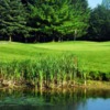 A view over the water of a green at Foxwood Golf Club