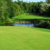 A view of a green with water coming into play at Red Course from Foxwood Golf Club