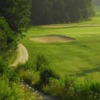 A view of a hole flanked by sand traps at Orangeville Golf Club
