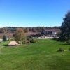 A view from a fairway with the clubhouse in background at Summerlea Golf Course