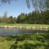 A view over a pond of hole #5 from Cherry Hill Club