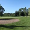 A view of a hole protected by bunkers at Harbour View Golf and Country Club