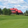 A view of the clubhouse from the 6th fairway at Diamond In The Ruff Golf Club