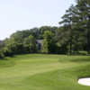 A sunny day view from a fairway at Maple Downs Golf and Country Club