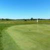 A sunny day view of a hole at Cloverdale Links Golf Course