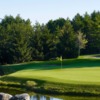 A view of a hole surrounded by water at Royal Ashburn Golf Club