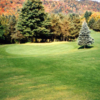 A view of a green at Whispering Pines Golf Course