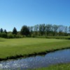 A view of a green with water coming into play at Meaford Golf and Country Club