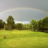 The rainbow over green #18 and the practice putting green at Roanoke Golf Club