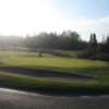 A sunny day view of a green at Emerald Greens Golf Course