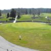 A view of a green surrounded by water at Talbot Trail Golf Club