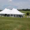 A view of a tee and a wedding tent at Buck's Crossing Golf Course.